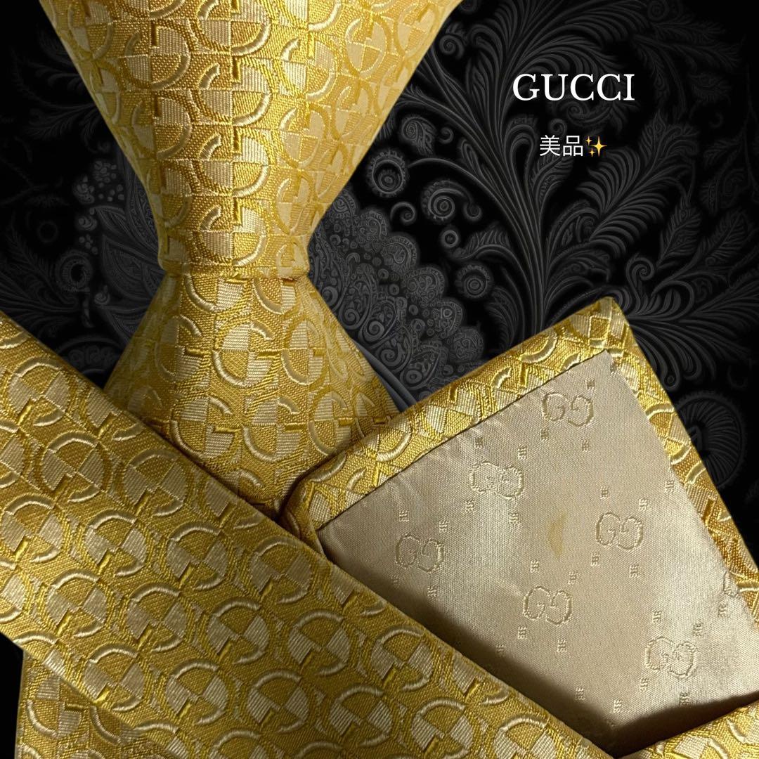 GUCCI ネクタイ Gロゴ柄 光沢 ゴールド パターン柄